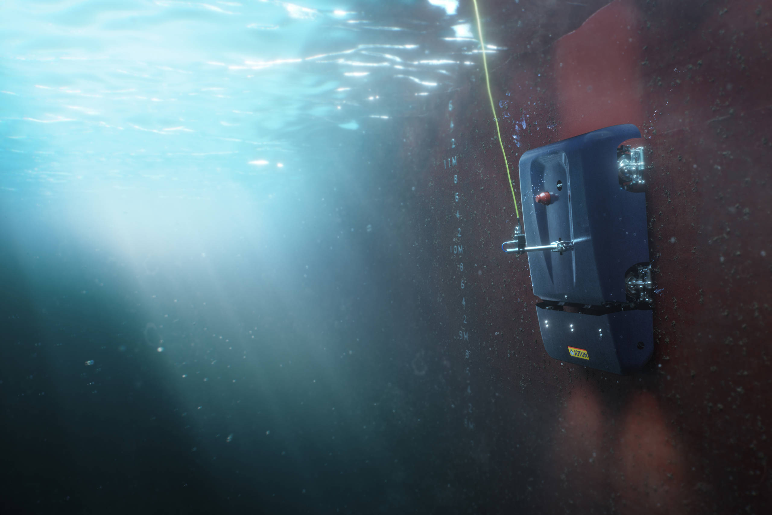 Jotun's HullSkater robot cleaning a ship hull below water